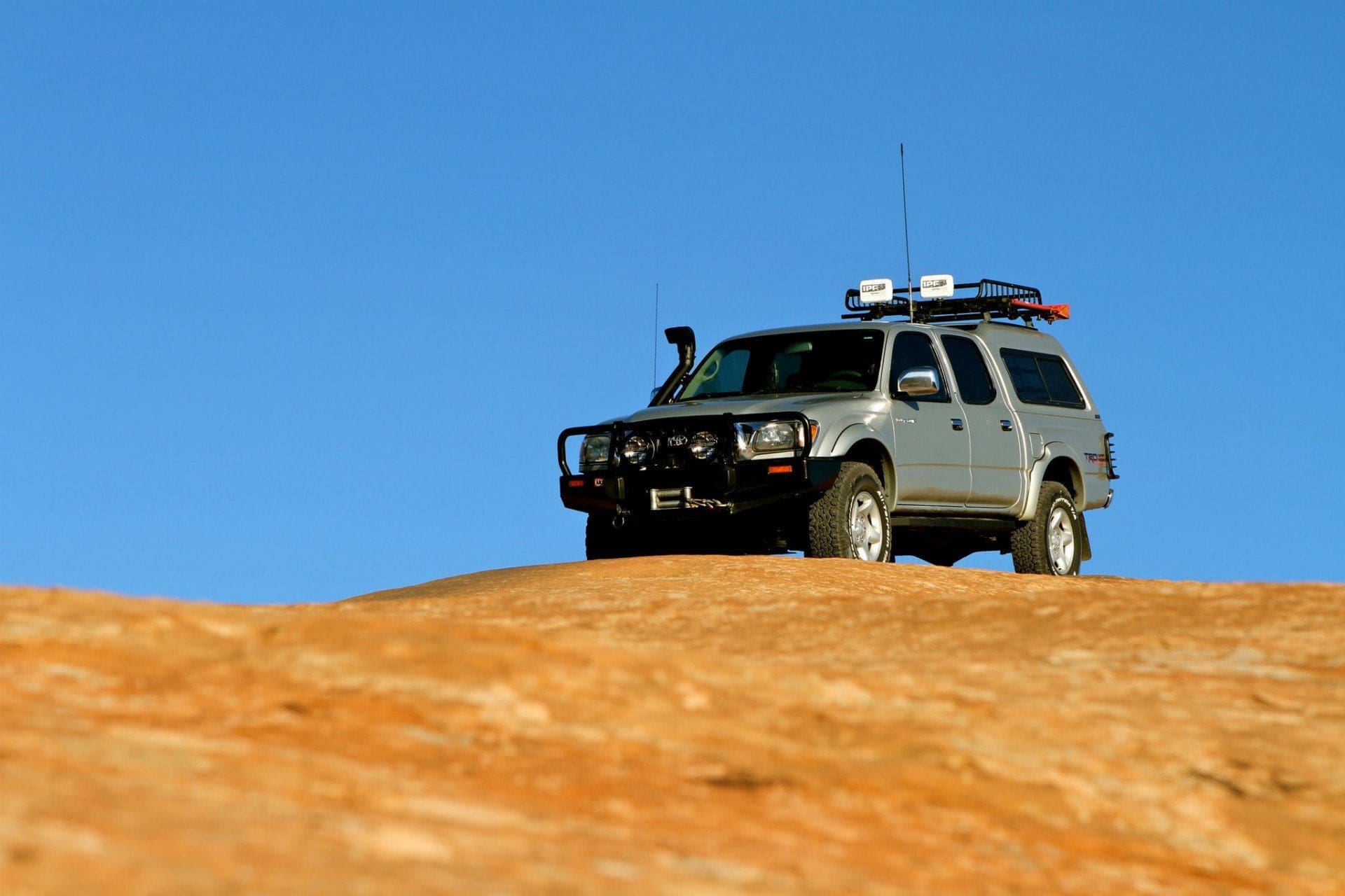 2001 silver Tacoma on sand dunes